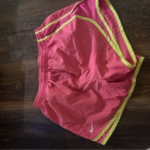 Nike Women's Bright Pink Athletic Shorts with Yellow Trim